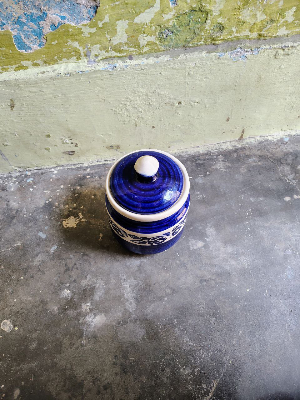 Open blue and white ceramic jar with lid multipurpose storage container top view
