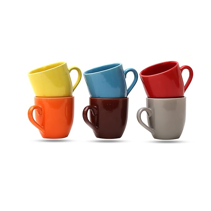 Multicolor Glossy Ceramic Tea Cups on Wooden Table