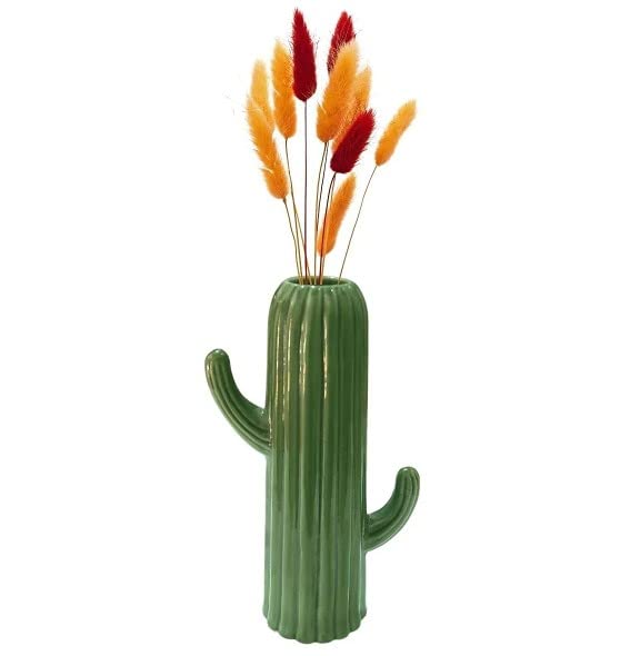 Green ceramic cactus vase styled with purple sunflower bouquet centerpiece